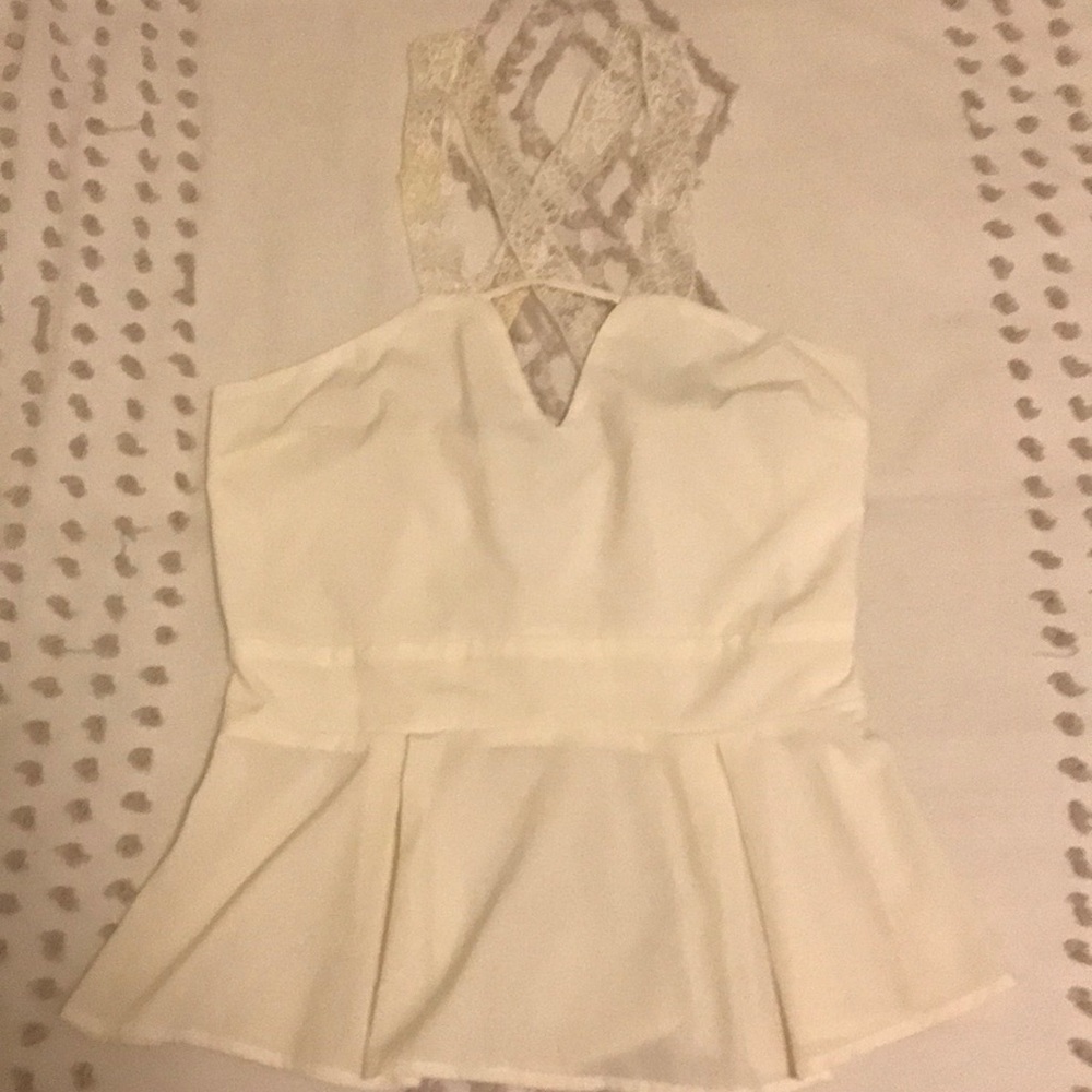 White peplum criss-cross lace strap top